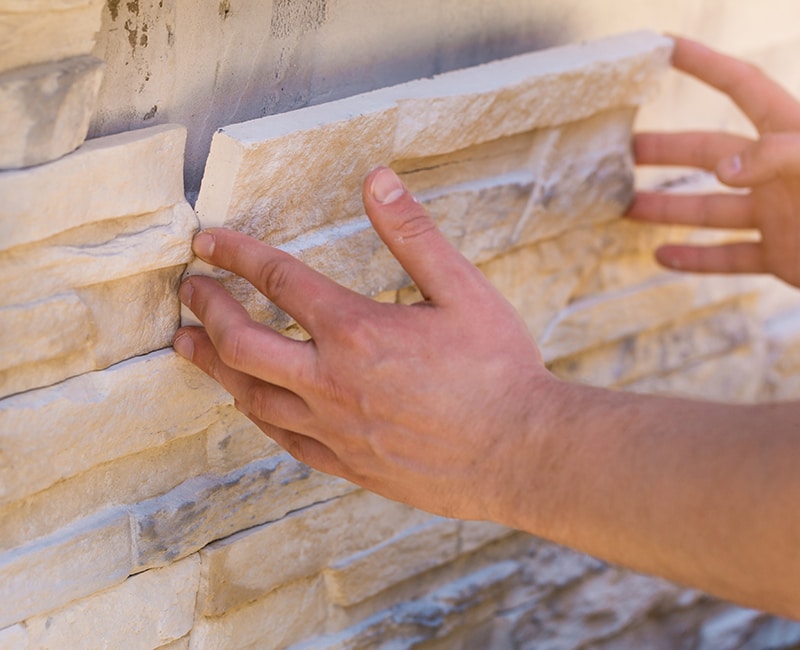 Stone veneer is a cost effective wall covering option for both interior and exterior spaces.